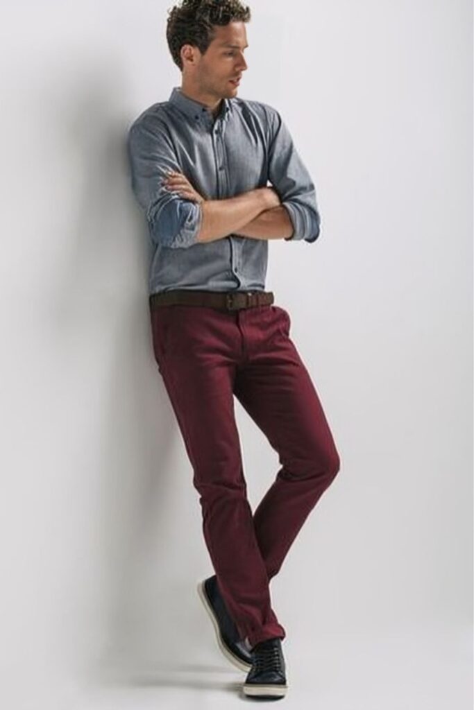 model in grey shirt and maroon pants