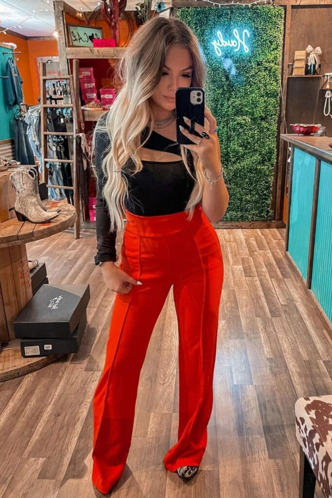 Bold Black Top and Cherry Red Trousers