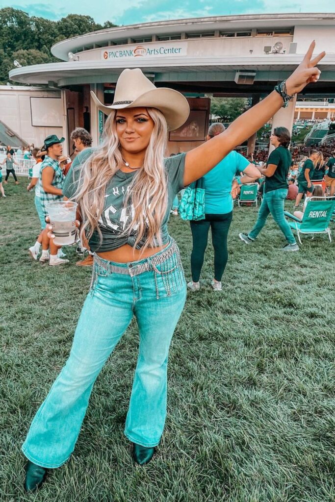 Faded High-Waisted Jeans and Knotted Tee