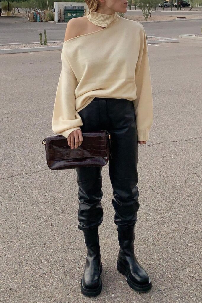 Cream Sweater and Brown Clutch