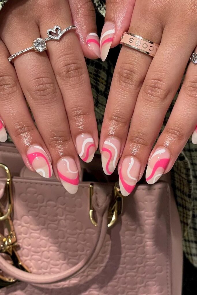 Elegant Pink and White Swirl Nails