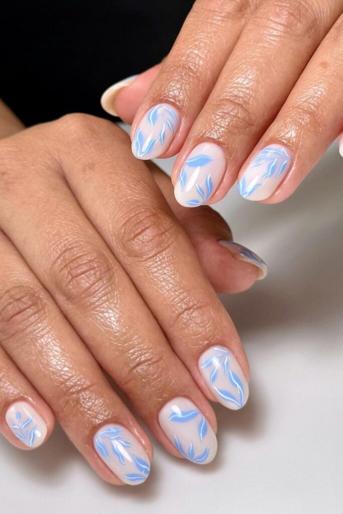 White Base Nails with Blue Strokes