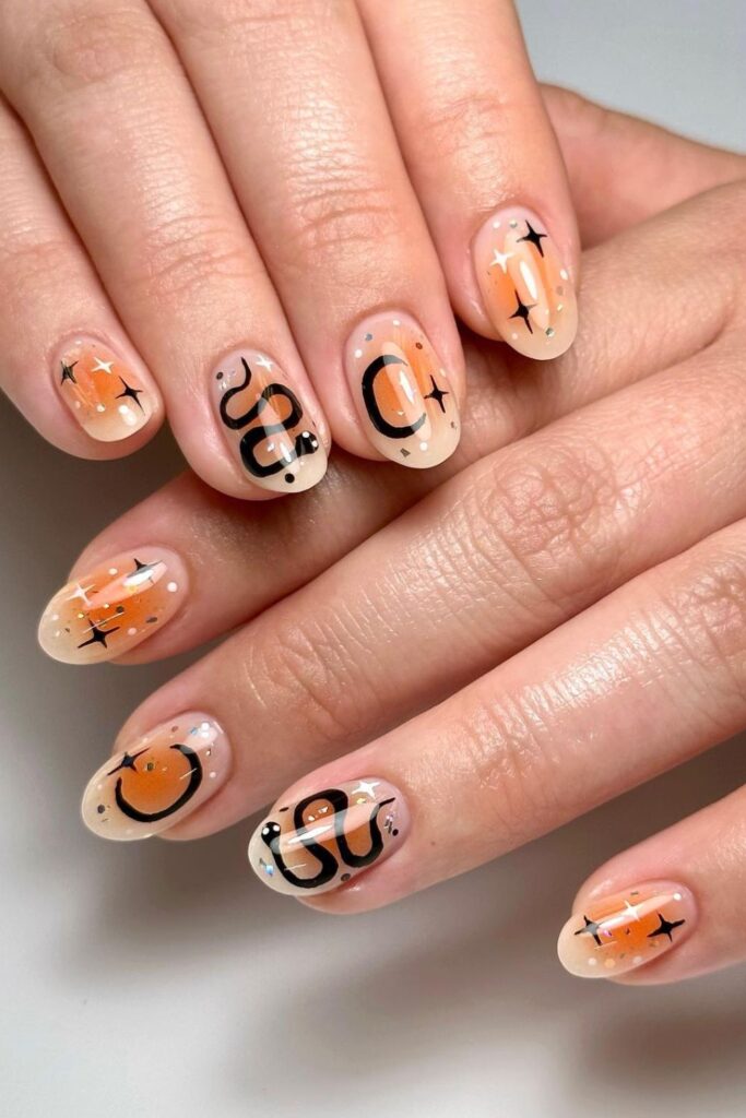 Halloween Nails with Pumpkins and Snakes