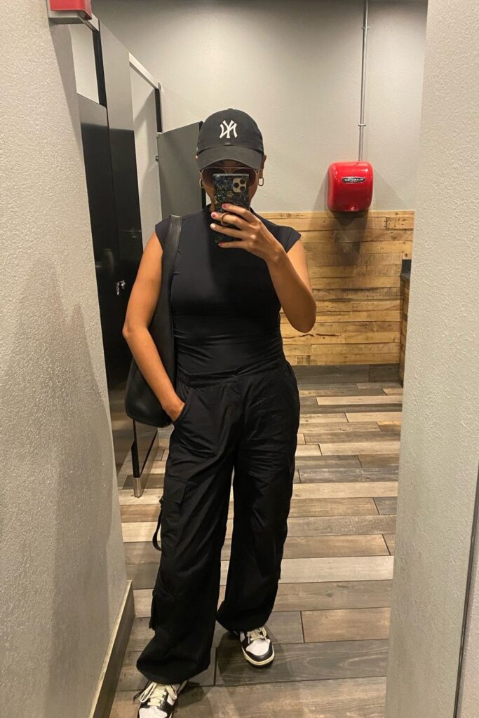 Sleeveless Bodysuit + Yankees Cap