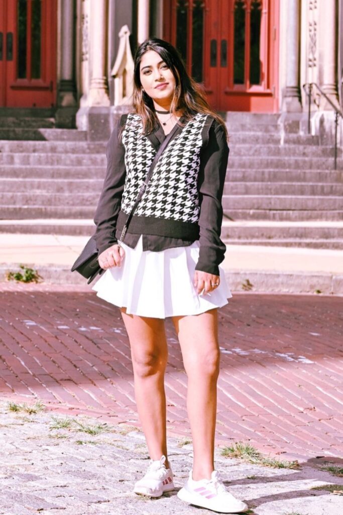 Houndstooth Vest, Black Top, White Skirt and Sneakers