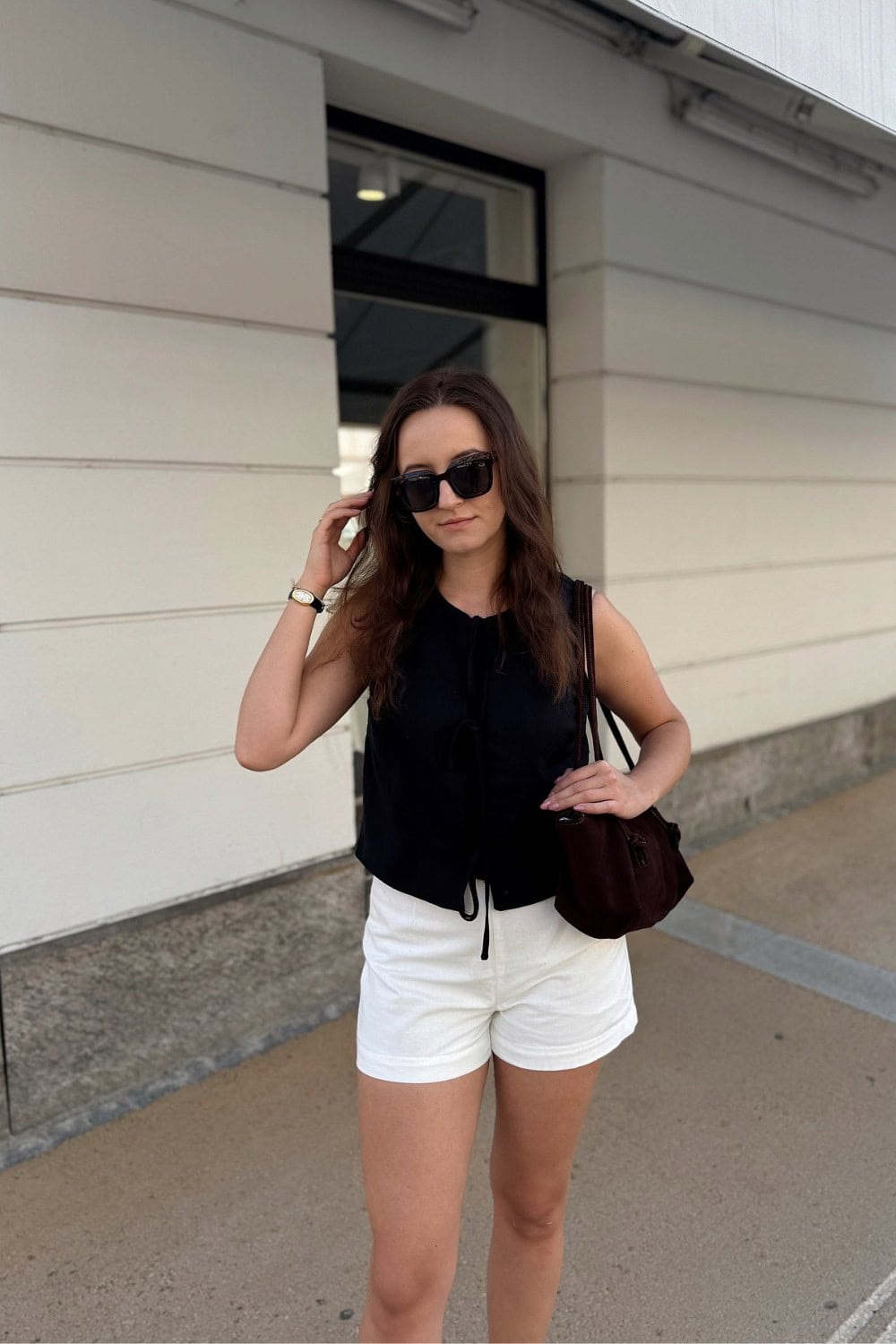 Black Sleeveless Top and White Shorts