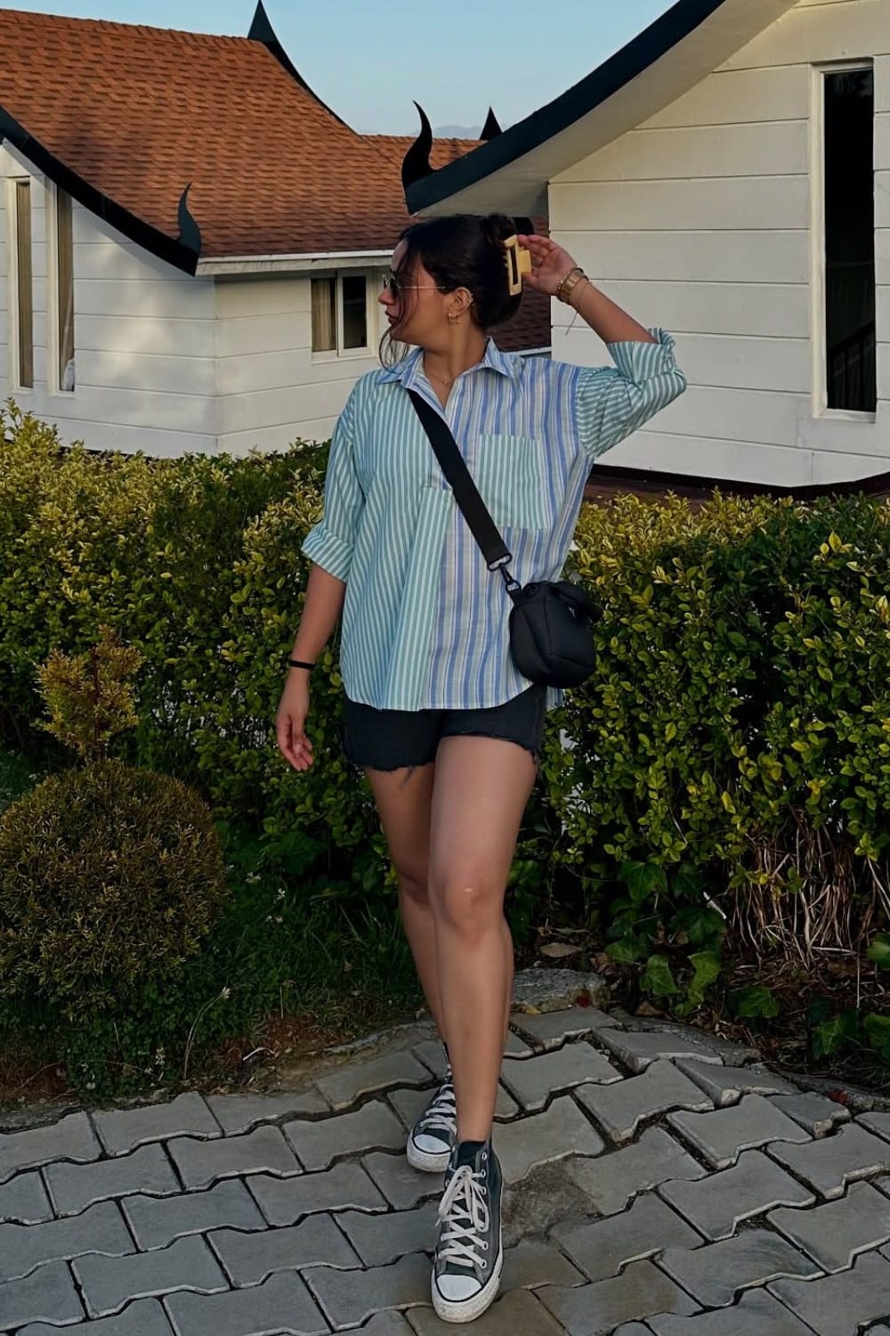 Blue White Striped Button-Up Shirt and Black Shorts