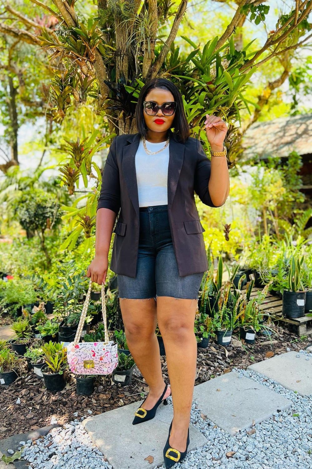 Black Blazer, White Crop Top, and Dark Denim Shorts