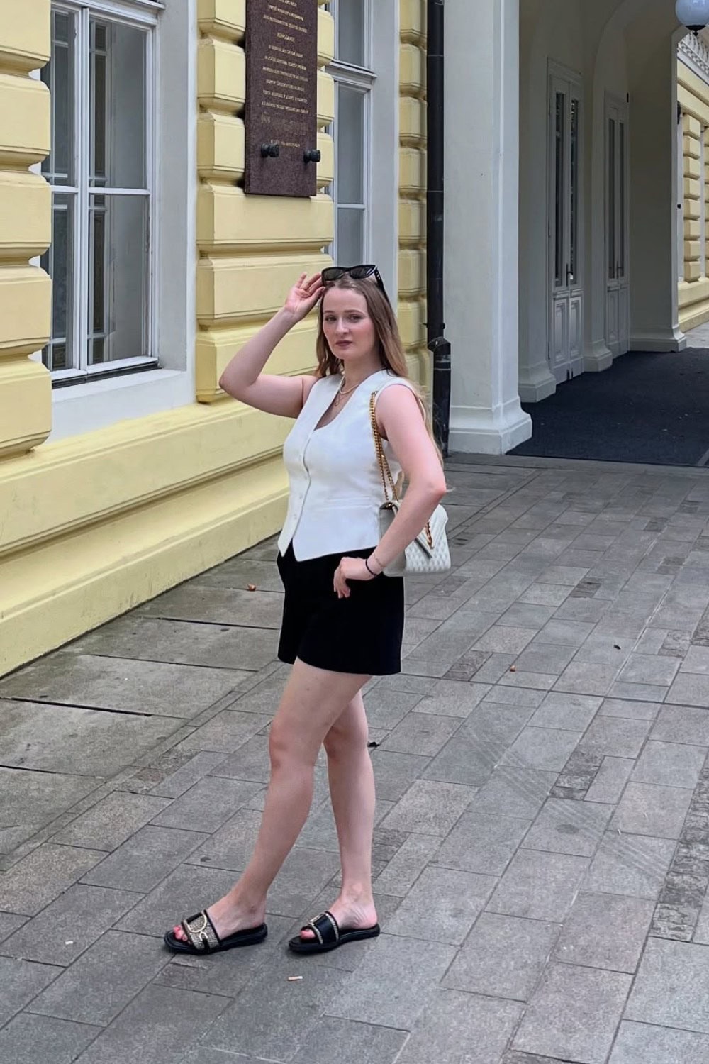 White Vest Top and Black Mini Skirt