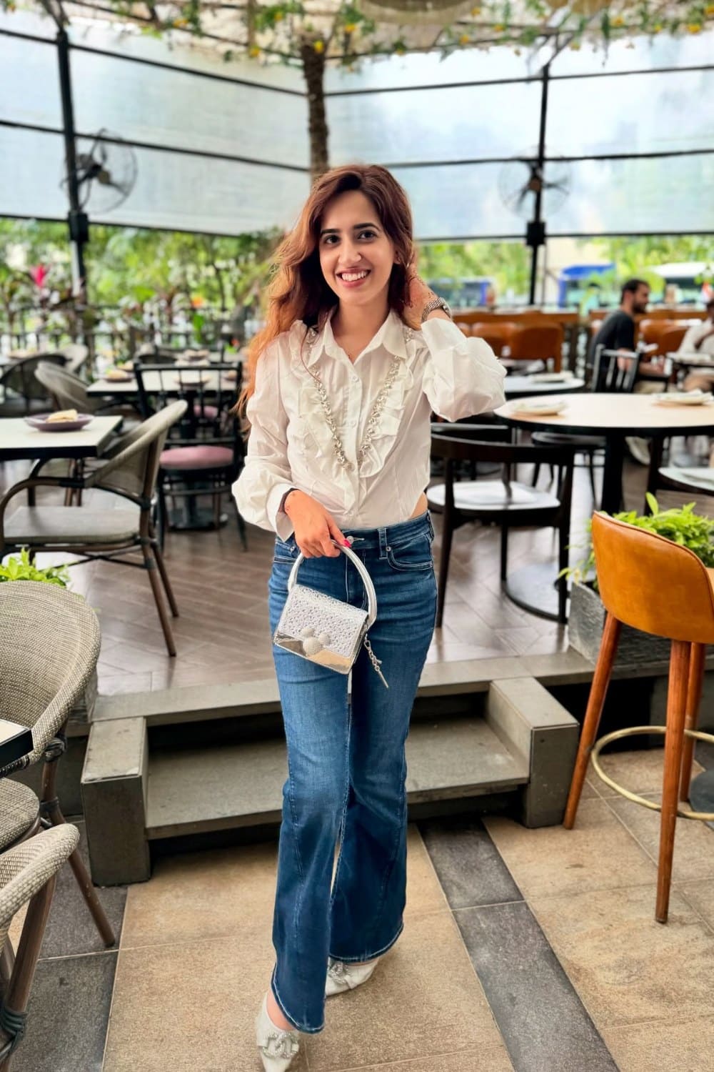 White Ruffled Blouse and Blue Wide-Leg Jeans