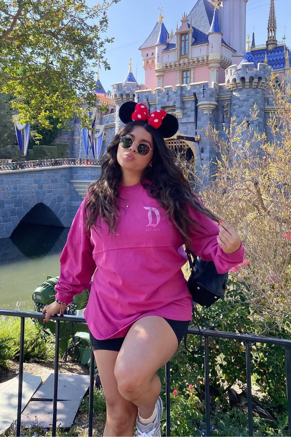 Bright Pink Sweatshirt and Black Shorts