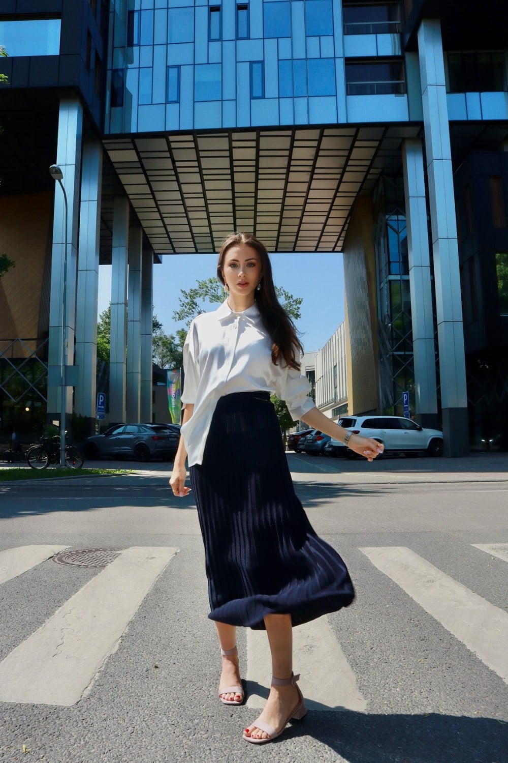 White Shirt and Navy Pleated Skirt