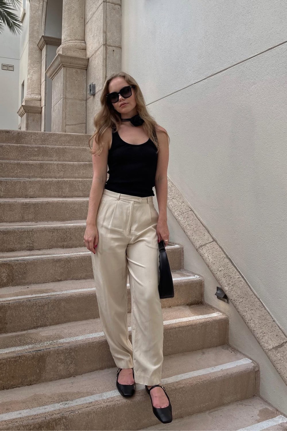 Black Tank and Cream Trousers