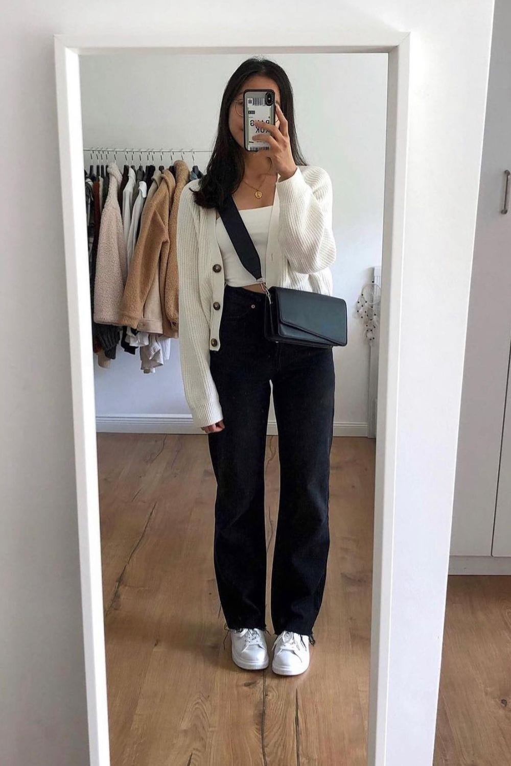 White Camisole, Black Jeans, and Cream Ribbed Cardigan