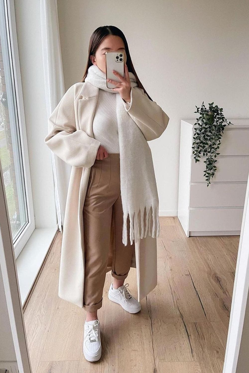 Cream Long Coat and Beige Trousers