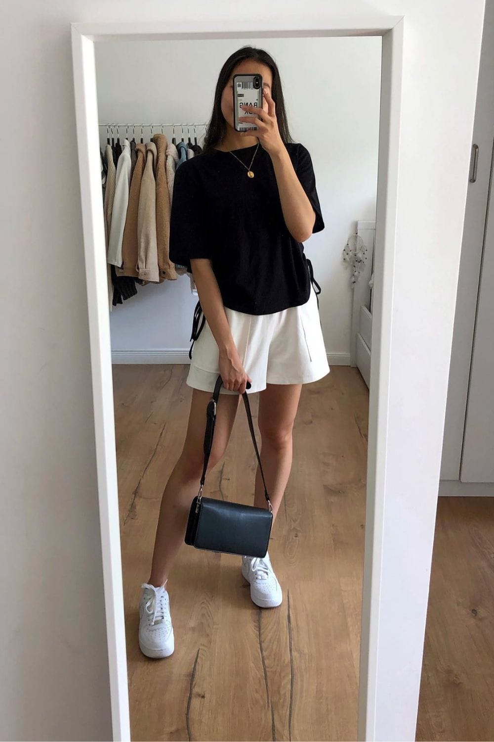 Black T-Shirt and White Tennis Skirt