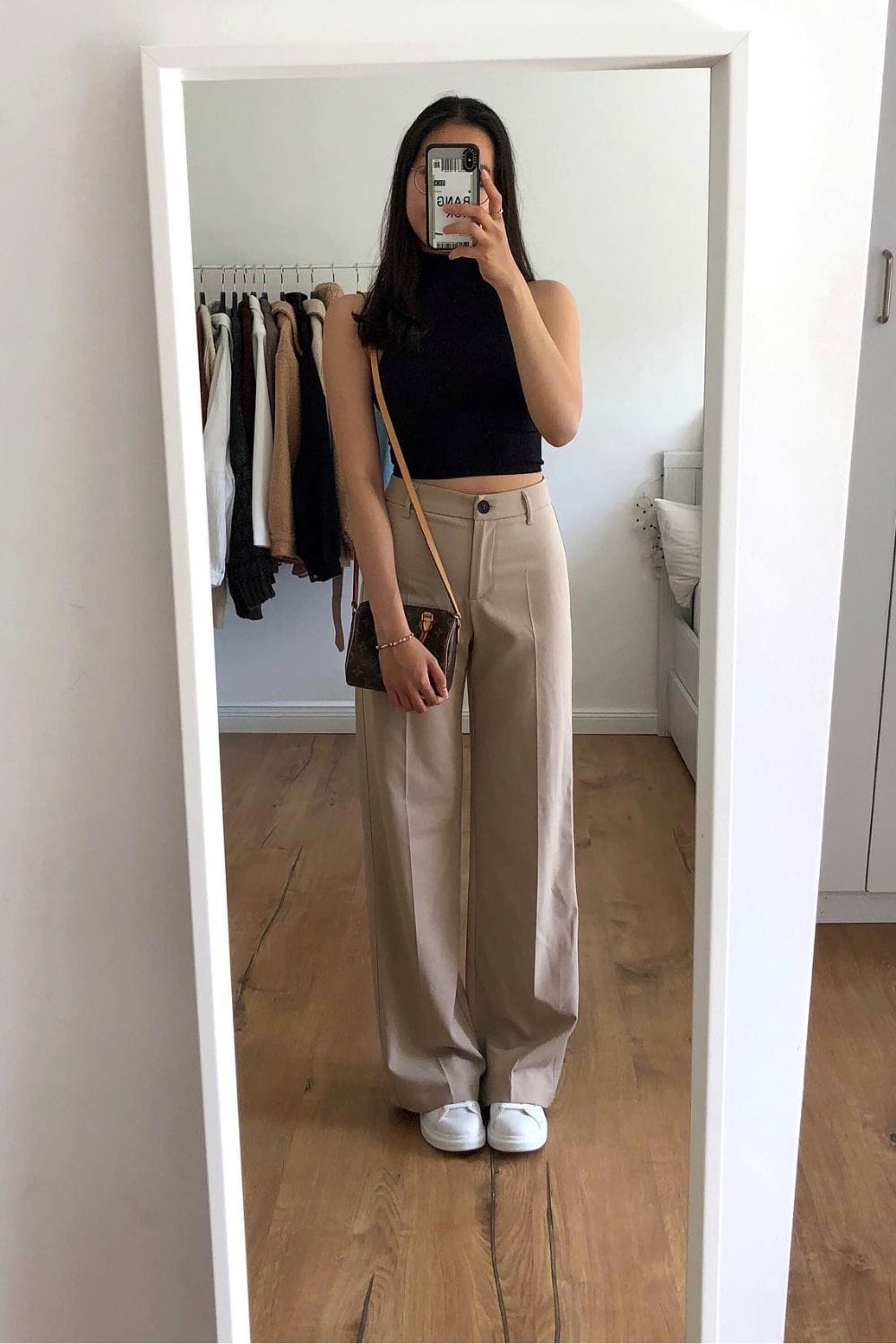 Black Sleeveless Crop Top and Beige Wide-Leg Trousers