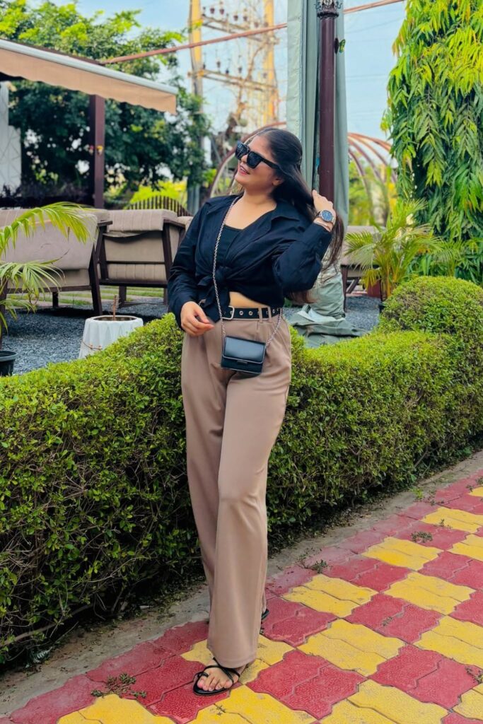 Black Shirt and Beige Trousers