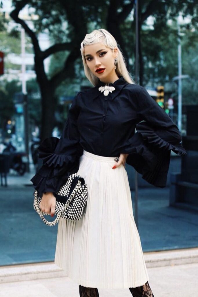 Black Shirt and White Pleated Skirt