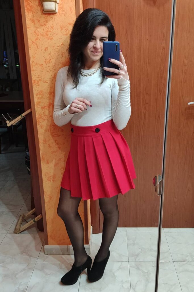 White Top and Red Pleated Mini Skirt
