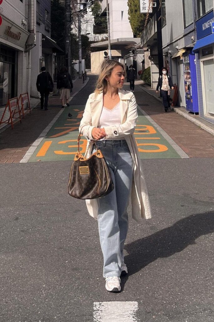 Cream Long Coat and Light Wash Jeans