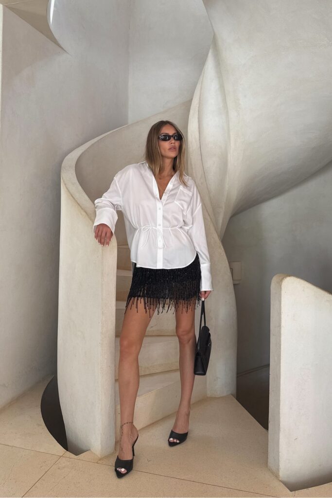 White Shirt and Black Fringe Mini Skirt