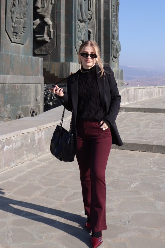 Turtleneck and Burgundy Trousers
