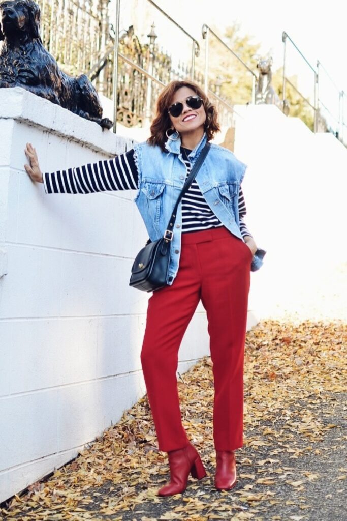 Striped Top, Denim Vest, and Red Trousers