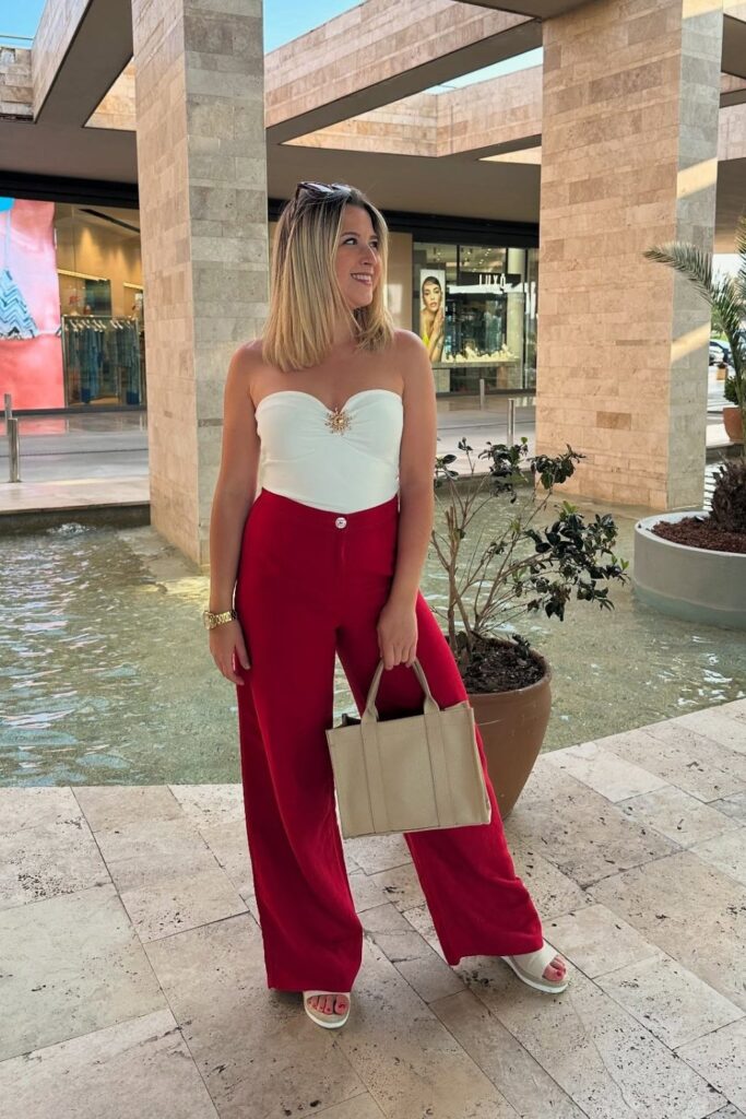 White Strapless Bodysuit and Red High-Waisted Pants