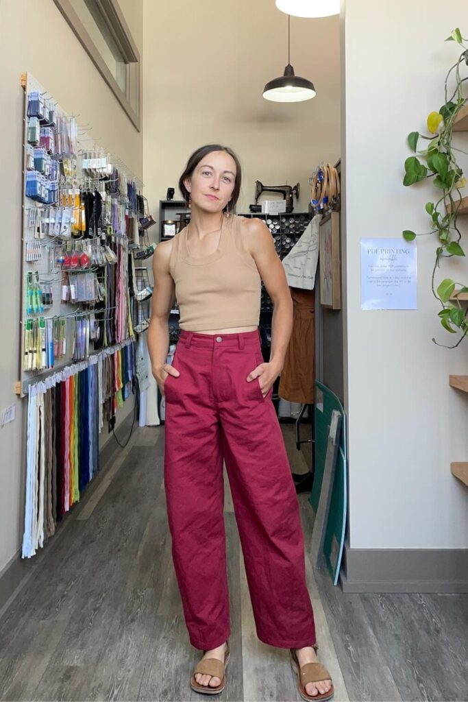 Beige Tank Top and Burgundy Wide-Leg Trousers