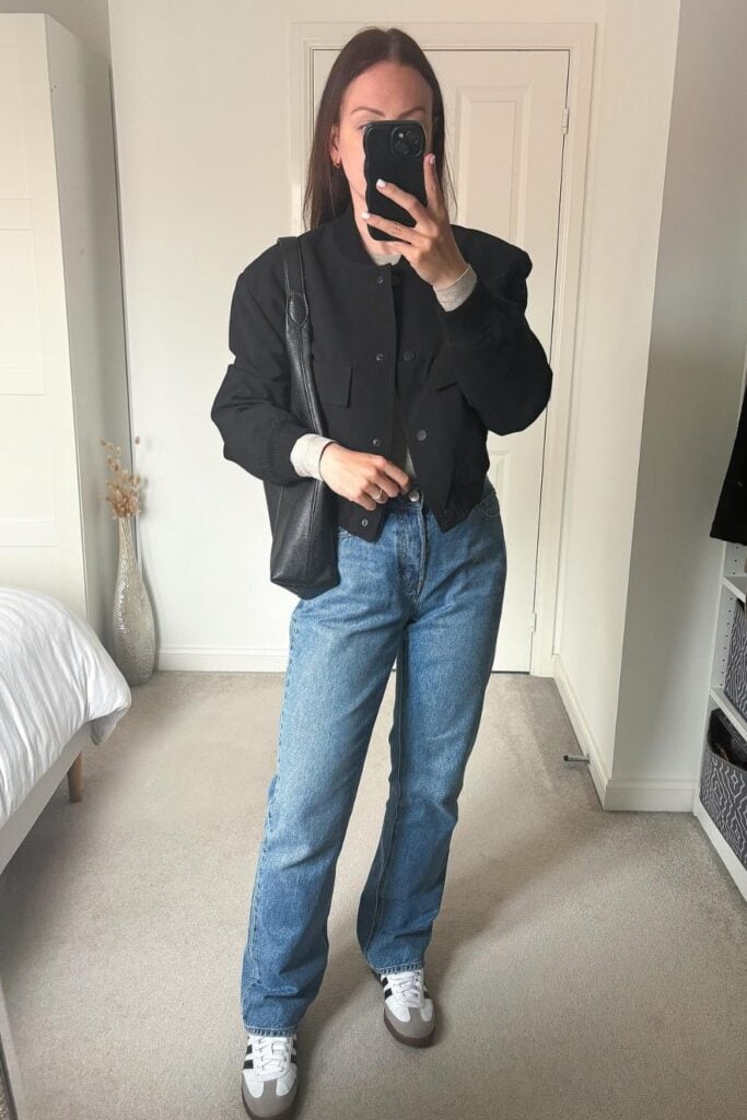 Black Bomber Jacket and White Sneakers