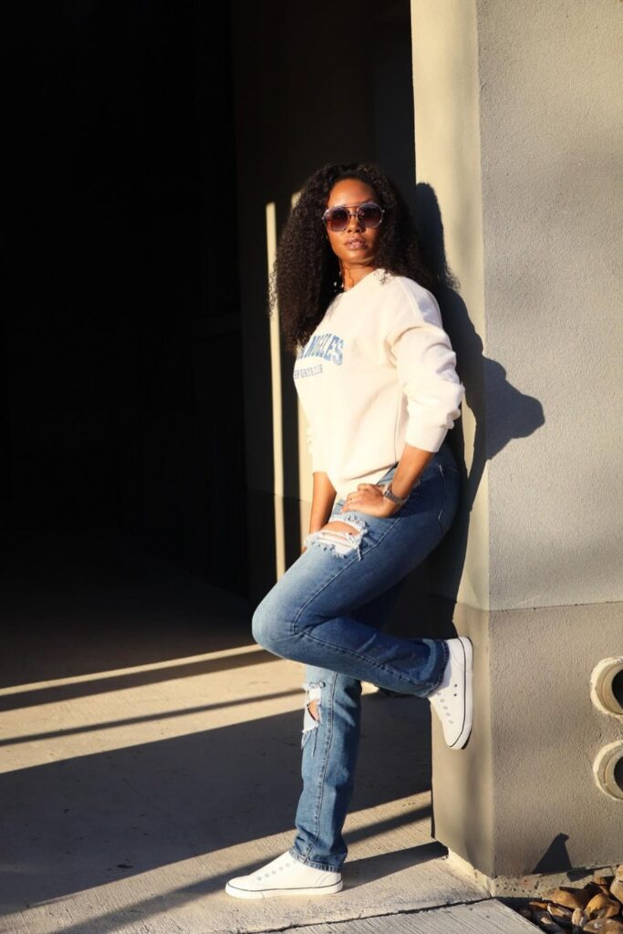White Sweatshirt and Ripped Jeans