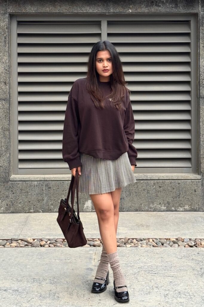 Oversized Sweatshirt and Pleated Mini Skirt