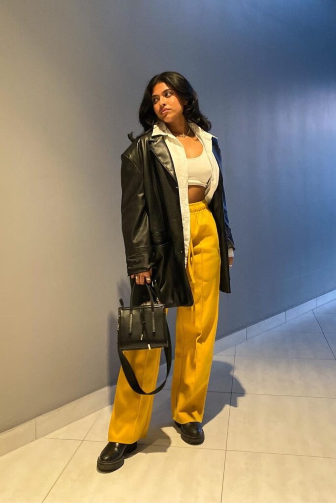 Black Leather Coat and Yellow Pants