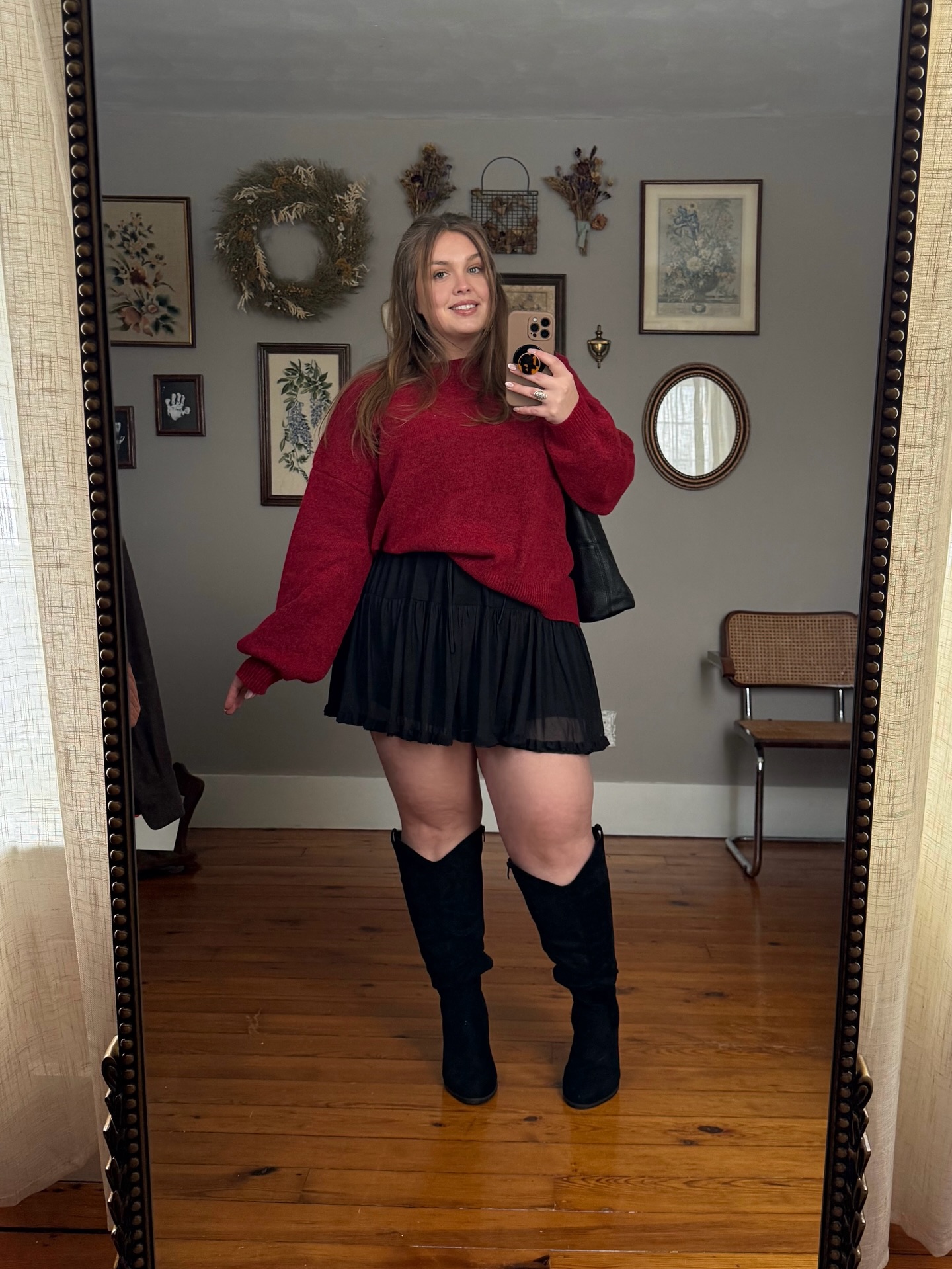 Vibrant Red Oversized Sweater and Black Pleated Mini Skirt