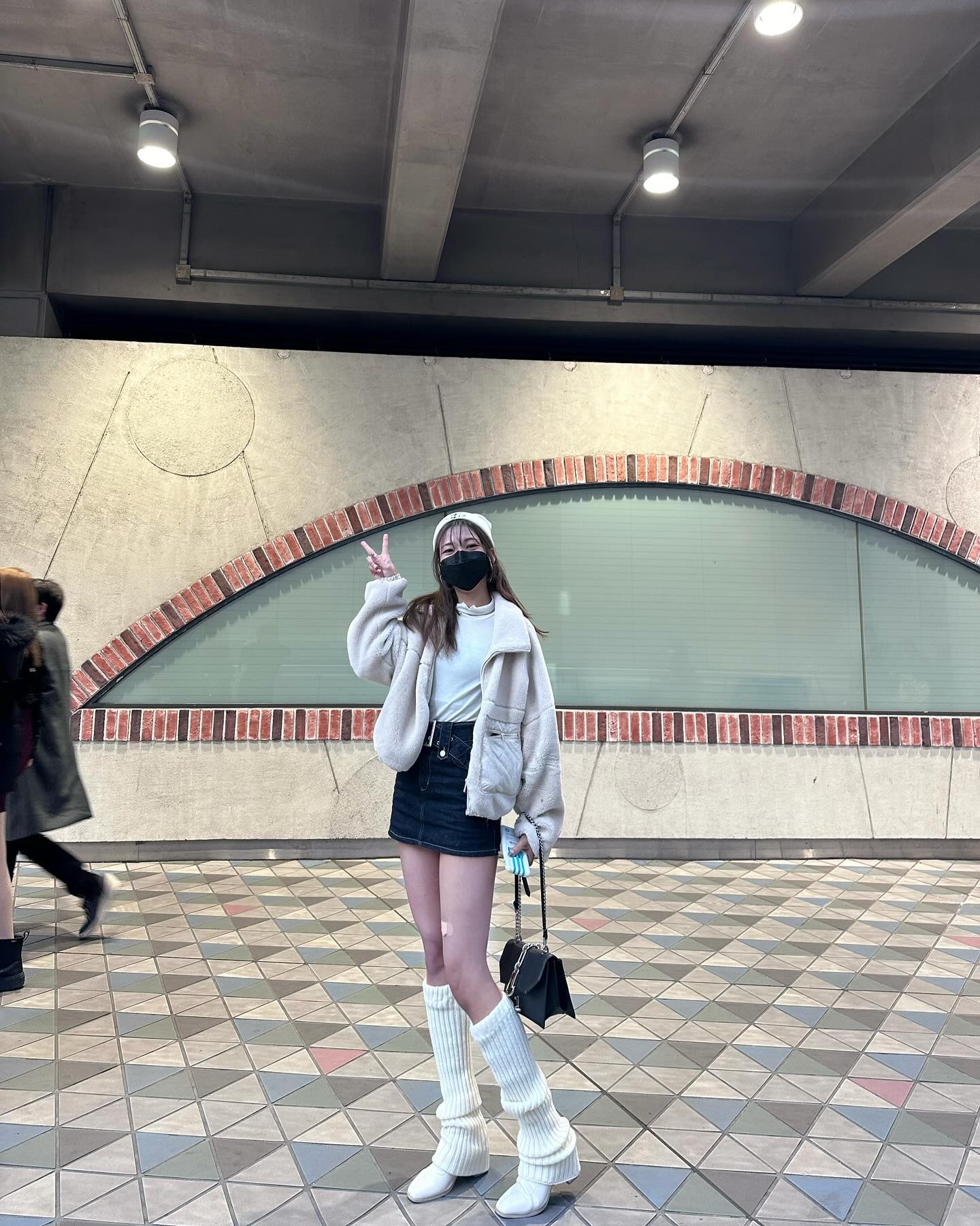 Puffer Jacket and Denim Mini Skirt