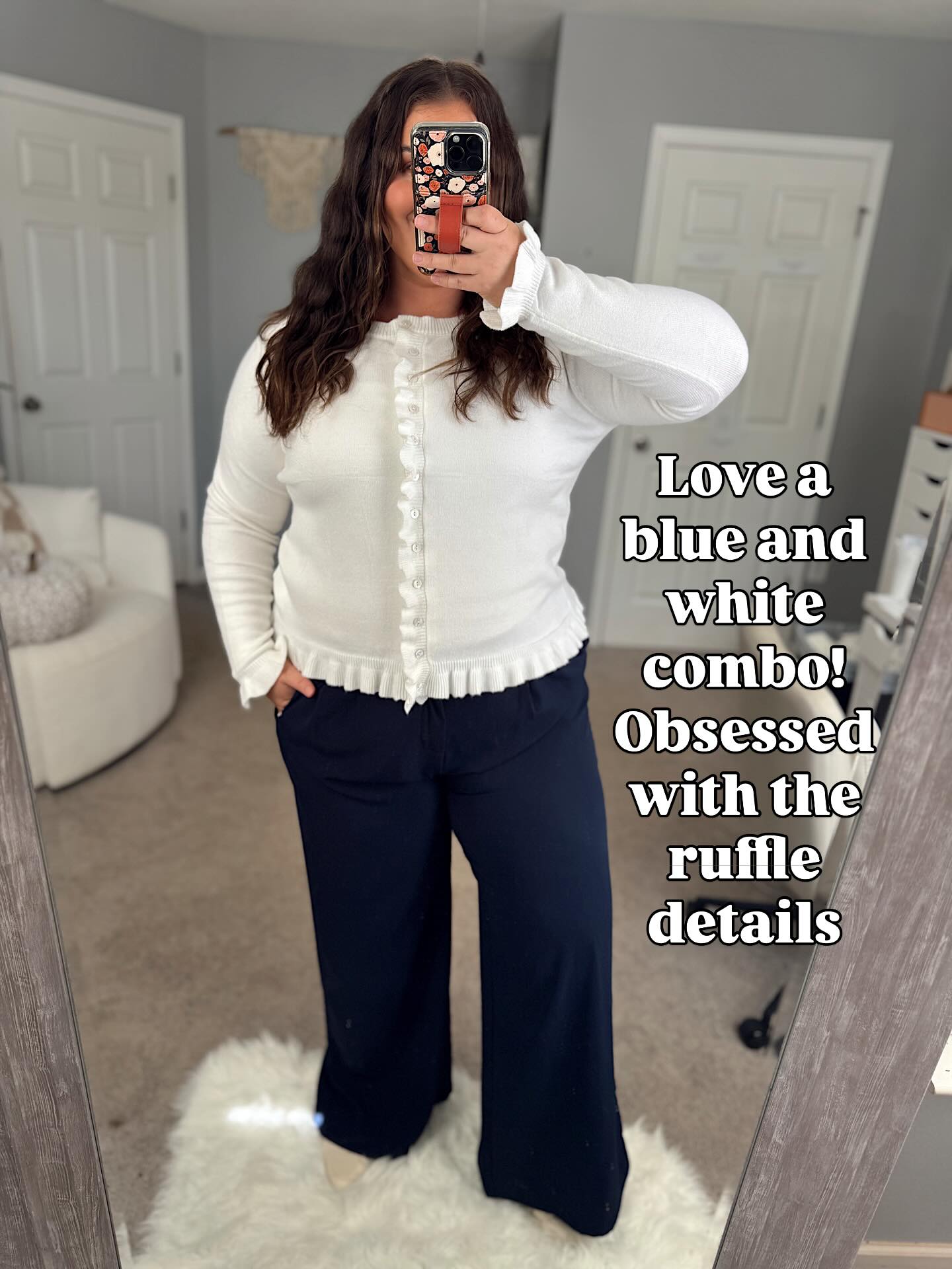 White Cardigan and Navy Trousers