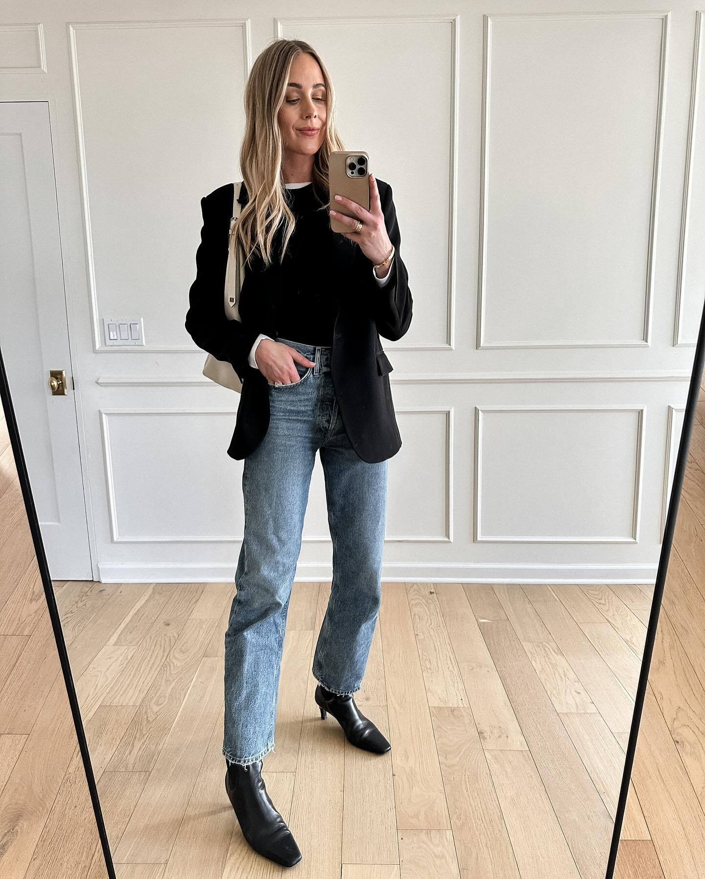 Black Sweater and Light Wash Jeans
