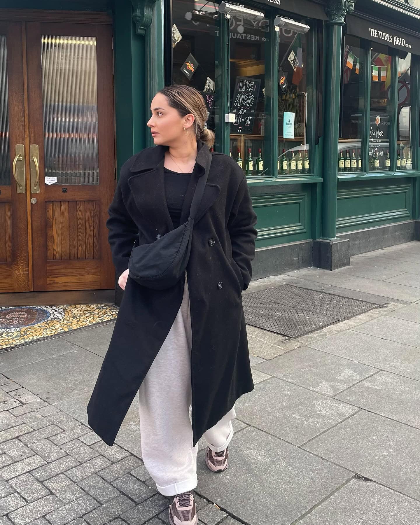 Long Black Coat and Wide-Leg Trousers