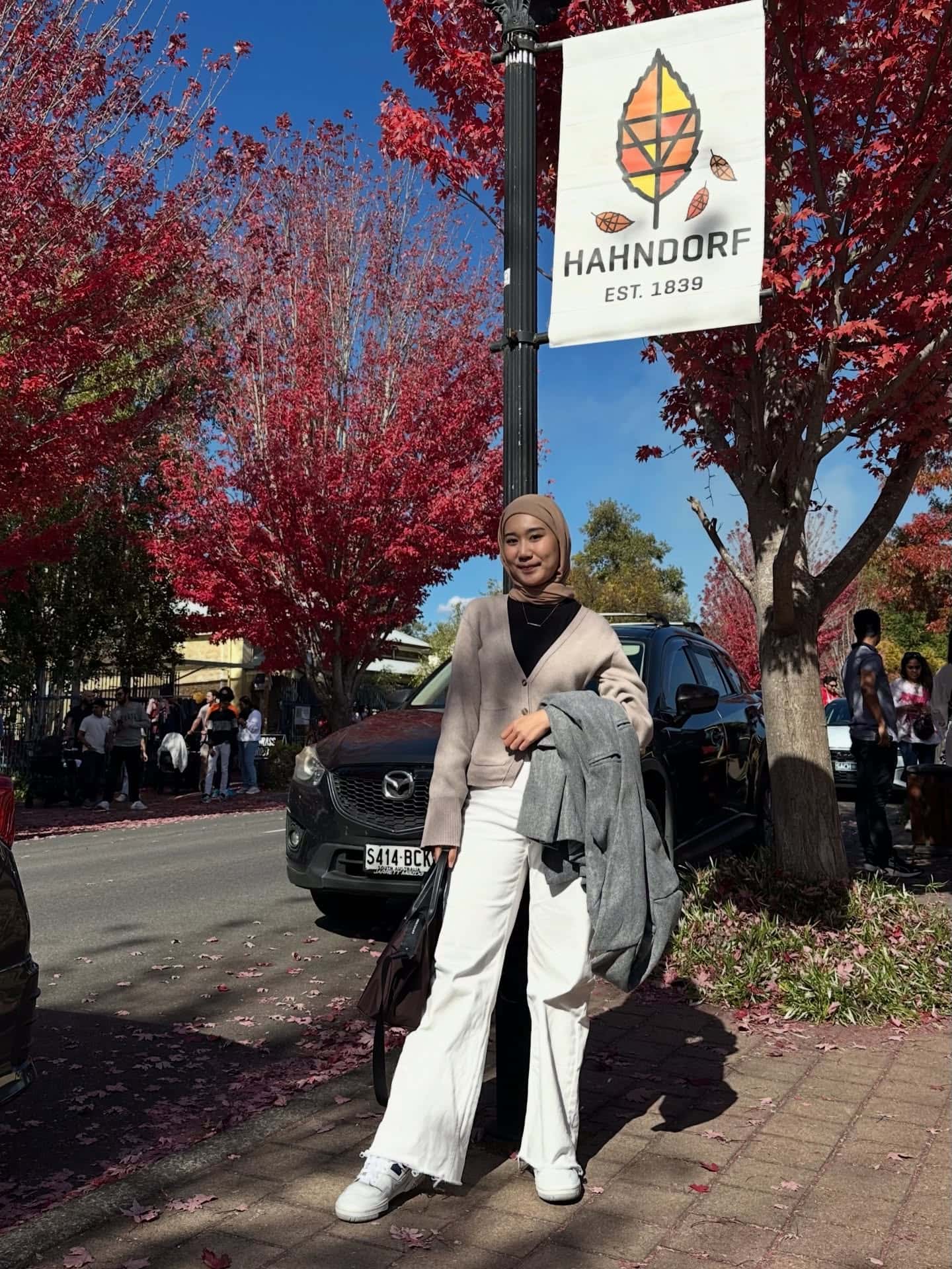 Beige Cardigan and White Pants