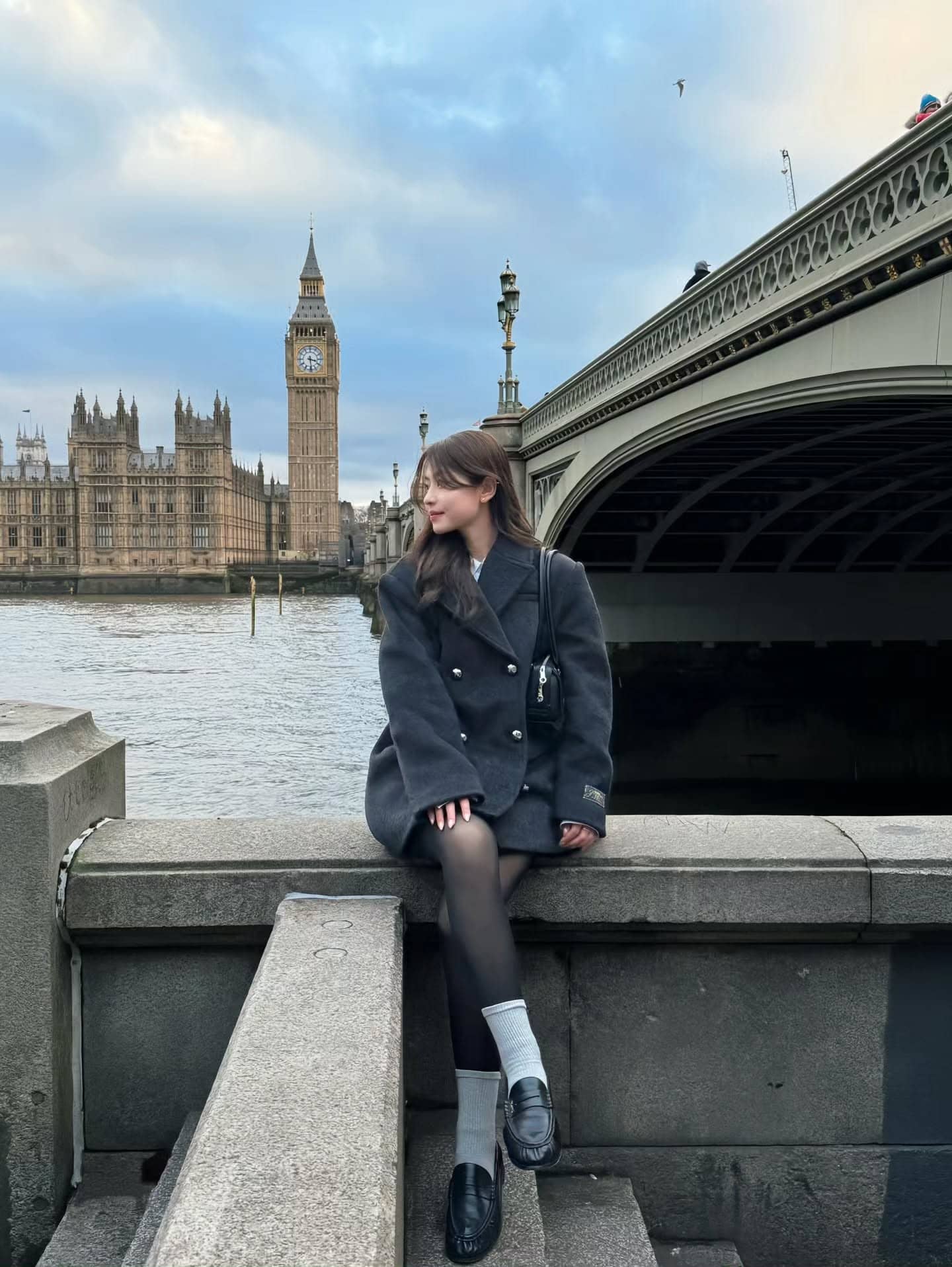 Double-Breasted Coat and Black Tights