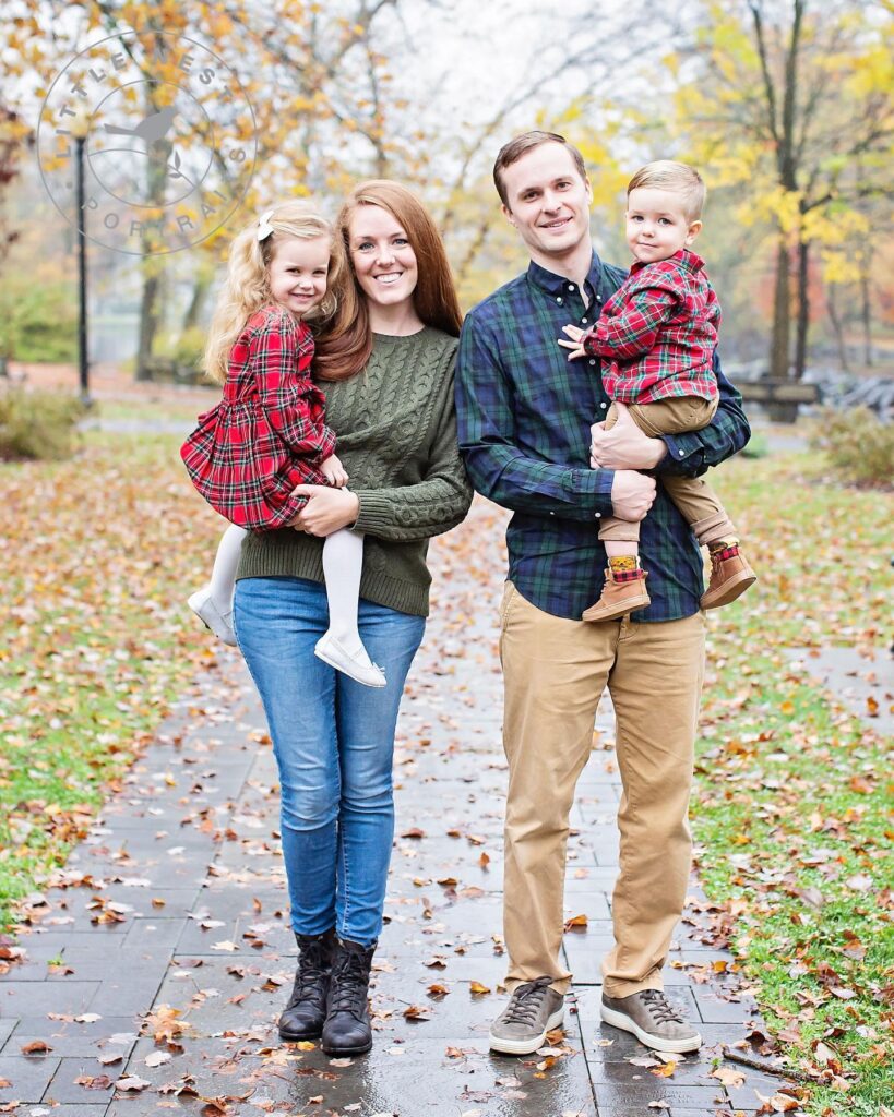 Family on a leafy path in plaid and olive