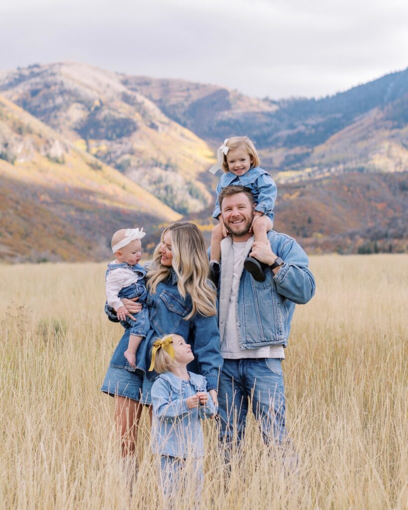 Family of five in head-to-toe denim in the mountains