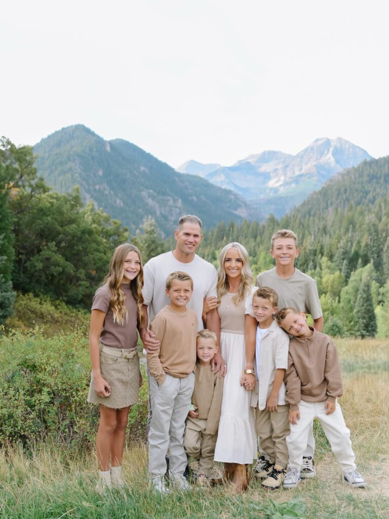 Large neutral-toned family in the mountains