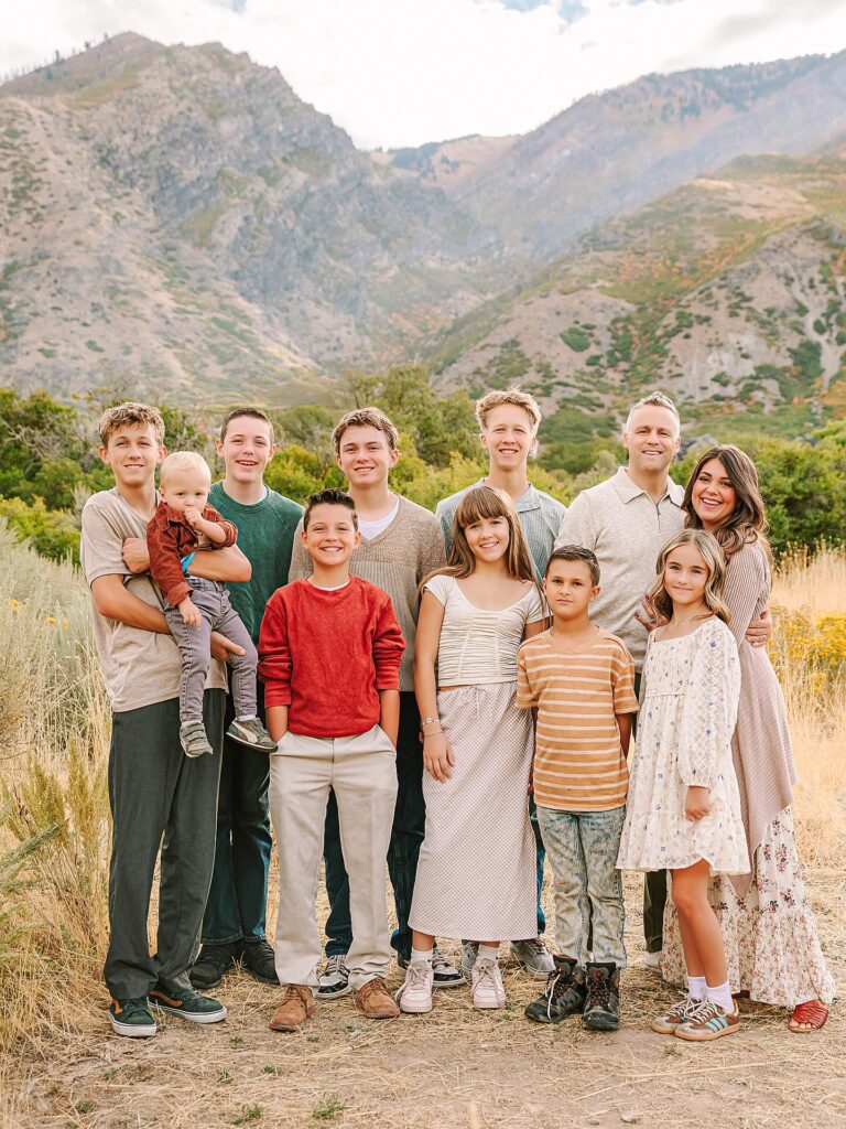 Large neutral-toned family in the mountains