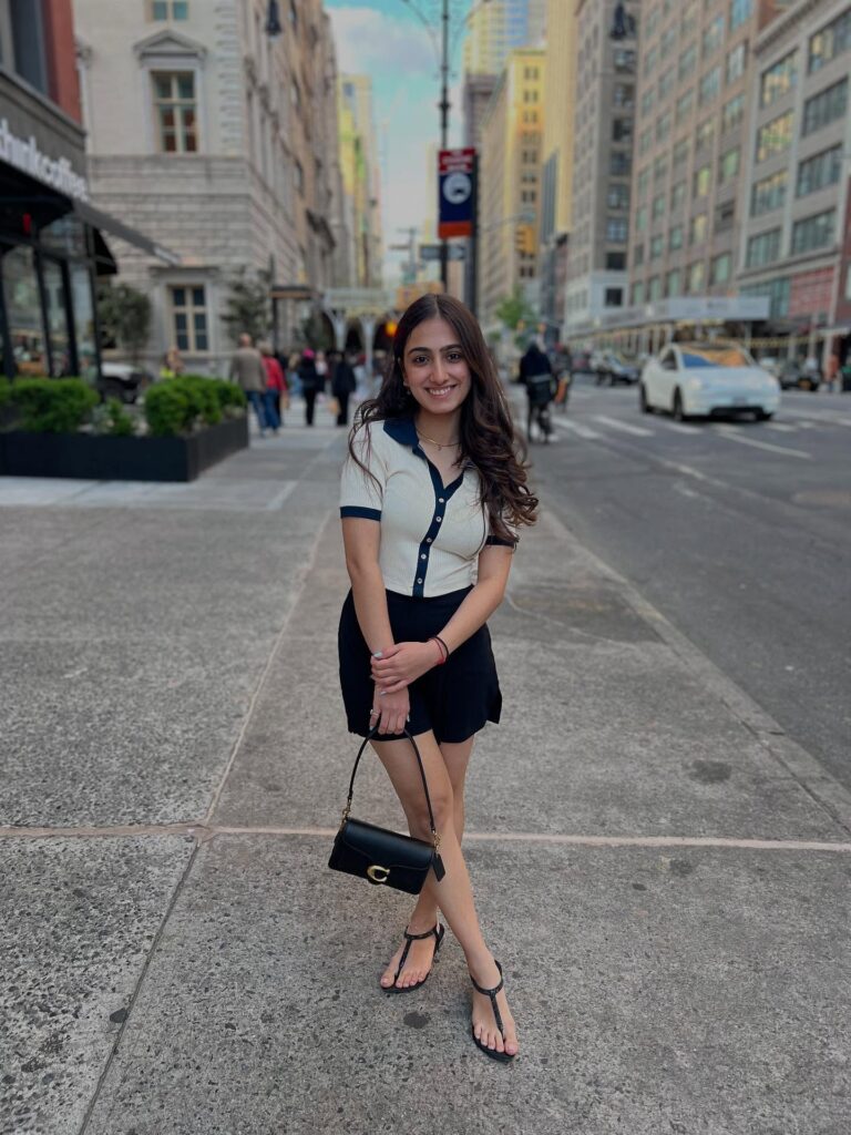 Cream Cardigan and Black Mini Skirt