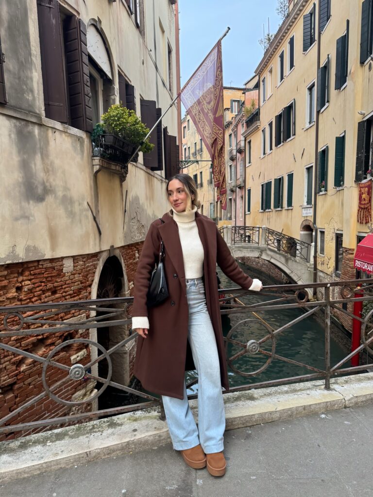 Chocolate coat + cream turtleneck in Venice